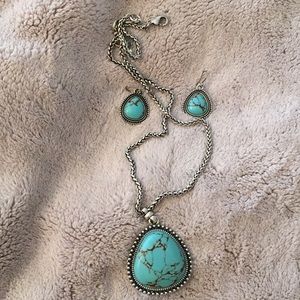 Brand new sliver chain and blue stone Necklace and earrings a unique set